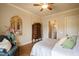 Comfortable bedroom featuring a wooden dresser, sitting chair and bed at 595 Legacy Falls N Dr, Chapel Hill, NC 27517
