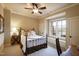 Bedroom with a ceiling fan, window seat, neutral walls, and soft carpet flooring at 595 Legacy Falls N Dr, Chapel Hill, NC 27517