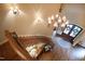 Grand foyer showcasing a curved staircase, chandelier and arched double-door entry at 595 Legacy Falls N Dr, Chapel Hill, NC 27517
