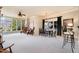 Spacious living space with a dining table and a bar area, perfect for entertaining at 595 Legacy Falls N Dr, Chapel Hill, NC 27517