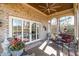 Covered porch with seating area overlooking the outdoor landscape at 595 Legacy Falls N Dr, Chapel Hill, NC 27517
