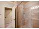 Modern walk-in shower with glass door and decorative tile at 595 Legacy Falls N Dr, Chapel Hill, NC 27517