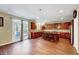 Spacious kitchen with custom cabinetry, a center island, and modern stainless steel appliances at 619 Ashburn Ln, Durham, NC 27703