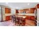 Well-lit kitchen with stainless steel appliances, ample cabinet space, and granite countertops at 619 Ashburn Ln, Durham, NC 27703