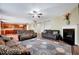 Open-concept living area with a fireplace, hardwood floors, and easy access to the kitchen at 619 Ashburn Ln, Durham, NC 27703