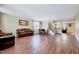 Spacious living room with hardwood floors, traditional furnishings, and ample natural light at 619 Ashburn Ln, Durham, NC 27703