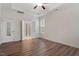 Empty bedroom with lots of space, vinyl plank flooring, and a doorway to the luxurious bathroom at 713 Catherine Lake Ct, Fuquay Varina, NC 27526