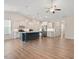 Modern kitchen with white cabinets, stainless steel appliances, and a center island at 713 Catherine Lake Ct, Fuquay Varina, NC 27526