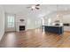 Bright living room with fireplace and french doors leading to outdoor space at 713 Catherine Lake Ct, Fuquay Varina, NC 27526