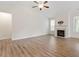 Bright, open living room features a fireplace, high ceilings, and natural light at 713 Catherine Lake Ct, Fuquay Varina, NC 27526