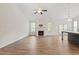 Spacious living room with high ceilings, fireplace, and access to the backyard at 713 Catherine Lake Ct, Fuquay Varina, NC 27526