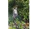 The yard has a unique yard art sculpture at 748 Currituck Dr, Raleigh, NC 27609