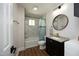 Stylish bathroom features a tub/shower combo with tiled surround and a granite-topped vanity at 808 Grace Ave, Burlington, NC 27217