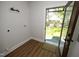 Laundry room with access to backyard at 808 Grace Ave, Burlington, NC 27217