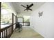 Cozy covered porch featuring a ceiling fan, modern furniture, and a 'Home Sweet Home' sign at 808 Grace Ave, Burlington, NC 27217