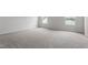 New bedroom with neutral carpet, base molding, fresh paint and two large windows at 84 Grove Township Way, Angier, NC 27501
