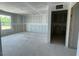Open concept living room with an entrance to another room and a window at 84 Grove Township Way, Angier, NC 27501