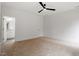 Spacious bedroom features neutral carpeting and modern ceiling fan at 1007 E Davie St, Raleigh, NC 27601