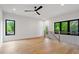 Bright, airy living space with natural light and gorgeous hardwood flooring at 1007 E Davie St, Raleigh, NC 27601