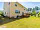 Expansive backyard with well-maintained lawn and wooden deck, great for outdoor entertaining at 101 Vista Brooke Dr, Morrisville, NC 27560