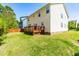 Lush backyard featuring a wooden deck and ample green space perfect for recreation at 101 Vista Brooke Dr, Morrisville, NC 27560