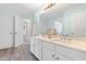 Spacious bathroom with double vanity, large mirror, and modern fixtures at 101 Vista Brooke Dr, Morrisville, NC 27560