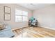 Bright bedroom features hardwood floors and natural light at 101 Vista Brooke Dr, Morrisville, NC 27560