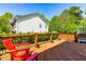 Comfortable deck with comfortable red chairs, ideal for relaxation and outdoor enjoyment at 101 Vista Brooke Dr, Morrisville, NC 27560