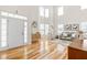 Airy living room featuring high ceilings, natural light, a comfortable seating area, and elegant furnishings at 101 Vista Brooke Dr, Morrisville, NC 27560