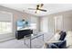 Comfortable living room features a TV, plush seating, and a modern coffee table at 101 Vista Brooke Dr, Morrisville, NC 27560