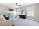 Comfortable living room featuring a TV, plush seating, and modern furniture at 101 Vista Brooke Dr, Morrisville, NC 27560