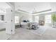 Bright primary bedroom features tray ceilings, large windows, and a decorative rug at 101 Vista Brooke Dr, Morrisville, NC 27560