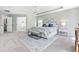 Spacious primary bedroom with tray ceilings, patterned headboard, and ensuite bathroom at 101 Vista Brooke Dr, Morrisville, NC 27560