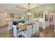 Open dining room with decorative lighting, open to kitchen at 108 Berry Mill Ln # 132, Raleigh, NC 27603