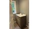 Bathroom featuring a vanity with storage, neutral paint, and natural light at 108 Virgil Rd, Durham, NC 27703