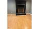 Cozy living space with a brick fireplace and mantel, ready for warm evenings at 108 Virgil Rd, Durham, NC 27703