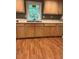 Kitchen with wood cabinets, neutral paint, and natural light at 108 Virgil Rd, Durham, NC 27703