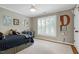 Bright bedroom with decorations, light walls, large window, and natural light at 111 Finnway Ln, Cary, NC 27519
