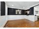Formal dining room with dark accent wall and wainscoting details at 111 Finnway Ln, Cary, NC 27519
