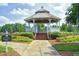Charming gazebo in a community park with manicured landscaping and brick walkway at 111 Finnway Ln, Cary, NC 27519