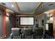 Home theater showcasing comfortable seating, a large projection screen, and immersive audio system for entertainment at 111 Finnway Ln, Cary, NC 27519