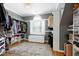 Walk-in closet with custom shelving, drawers, and a window for natural light at 111 Finnway Ln, Cary, NC 27519