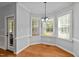 Dining nook features wood floor, ample windows and views to the backyard at 1141 Contender Dr, Clayton, NC 27520