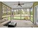 Relaxing screened-in porch with comfortable seating and a hammock, perfect for enjoying the outdoors at 115 Mill Run Ln, Sanford, NC 27330