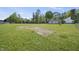 Expansive backyard with a mix of green space and open area, ready for a variety of outdoor activities at 1156 Darius Pearce Rd, Youngsville, NC 27596