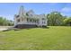 Charming home with a inviting front porch and well-manicured lawn, perfect for outdoor enjoyment at 1156 Darius Pearce Rd, Youngsville, NC 27596