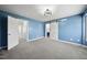 Comfortable primary bedroom with attached bathroom and walk-in closet, perfect for relaxation at 1156 Darius Pearce Rd, Youngsville, NC 27596