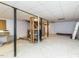 Spacious unfinished basement with utilities, supports and staircase at 116 Old Maple Ln, Durham, NC 27713