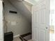 Basement crawl space access with interior door and tiled flooring at 116 Old Maple Ln, Durham, NC 27713