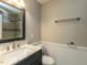 Bathroom with a new vanity and walk-in shower at 116 Old Maple Ln, Durham, NC 27713